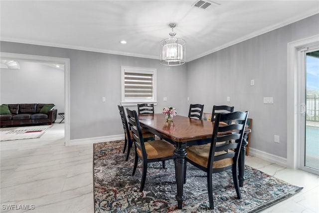 dining area with visible vents, crown molding, baseboards, a notable chandelier, and marble finish floor