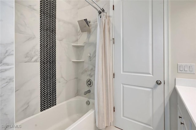 full bathroom featuring shower / bath combo with shower curtain and vanity