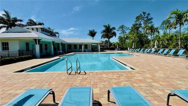 community pool with a patio