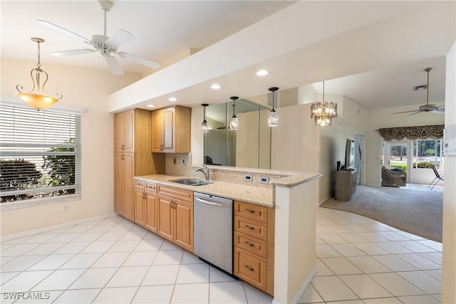 kitchen featuring a ceiling fan, a peninsula, light carpet, stainless steel dishwasher, and backsplash