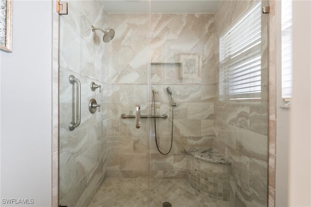 full bath featuring a stall shower