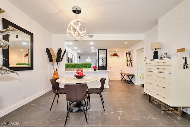 dining area featuring recessed lighting, visible vents, baseboards, and a notable chandelier