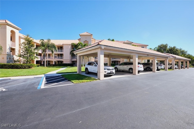 view of partially covered parking lot