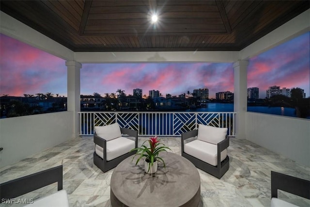 view of patio / terrace featuring outdoor lounge area and a city view