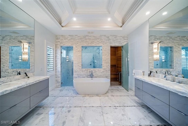 full bath with a freestanding tub, two vanities, a walk in shower, tile walls, and crown molding