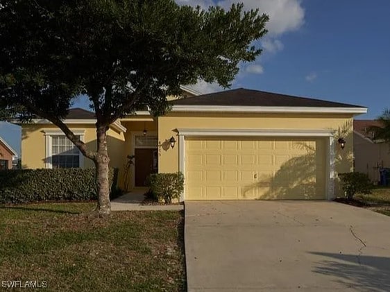 ranch-style house with stucco siding, driveway, and a garage