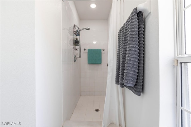 bathroom with a stall shower