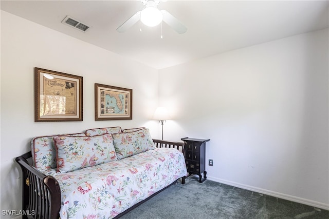 bedroom featuring visible vents, baseboards, carpet, and a ceiling fan