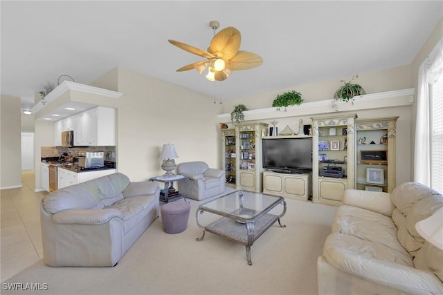 living room with light tile patterned floors and ceiling fan