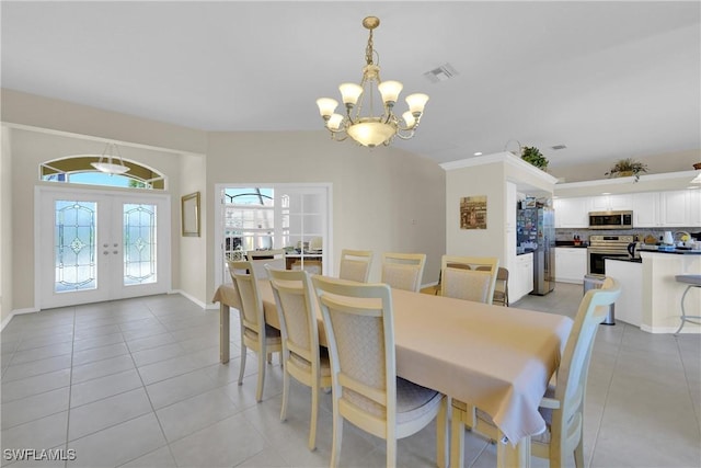 dining room featuring visible vents, baseboards, light tile patterned floors, french doors, and a notable chandelier