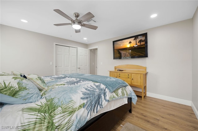 bedroom with visible vents, recessed lighting, light wood-style floors, and baseboards