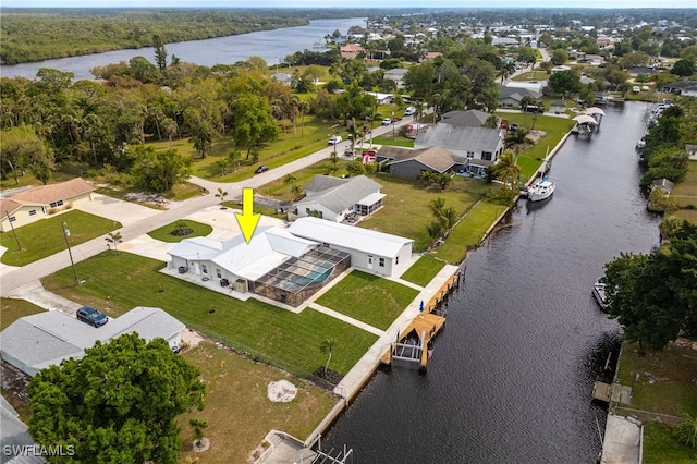 aerial view featuring a residential view and a water view