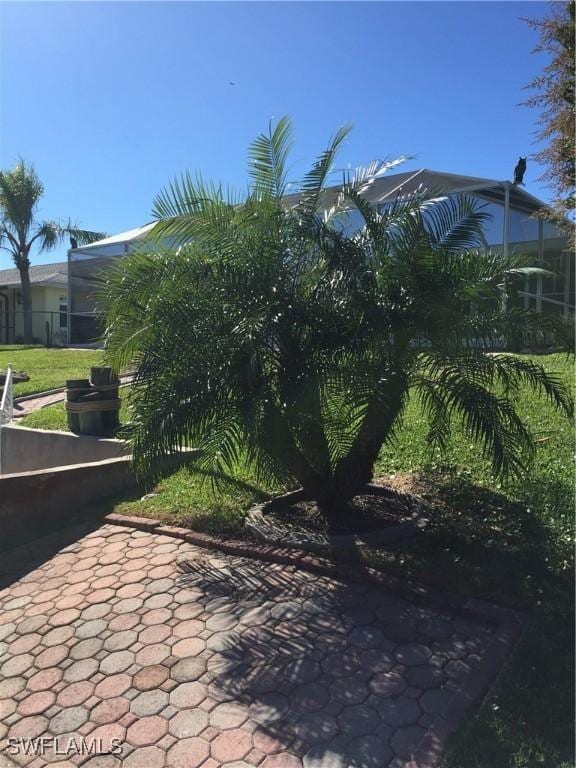 view of patio featuring fence