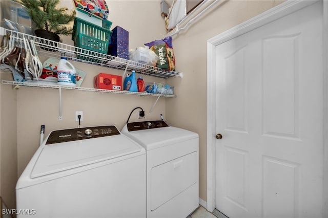 washroom with laundry area and washing machine and clothes dryer