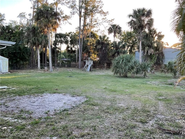 view of yard with fence