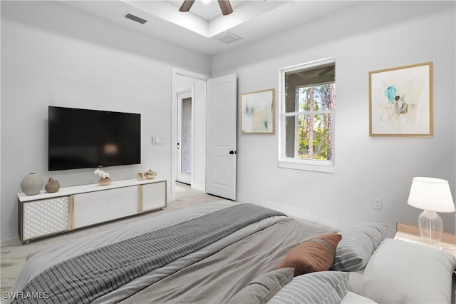 bedroom featuring visible vents and ceiling fan