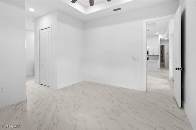 unfurnished room with recessed lighting, visible vents, marble finish floor, and a ceiling fan