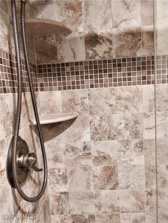 details featuring a tile shower