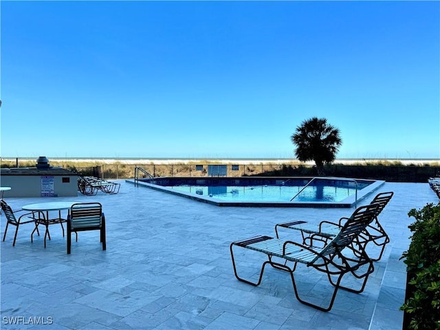 view of pool with a patio area