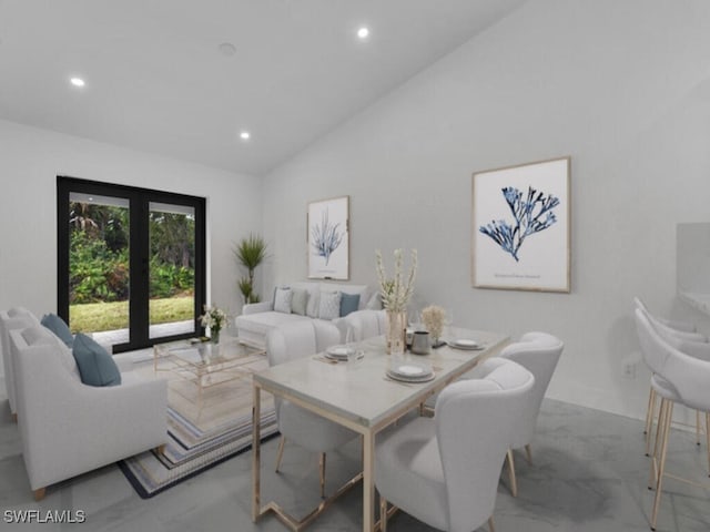 dining space with vaulted ceiling and recessed lighting