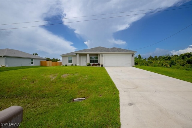 ranch-style house featuring an attached garage, driveway, a front lawn, and fence