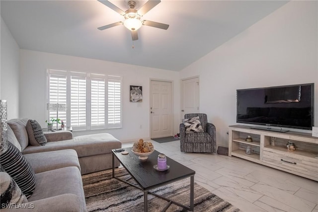 living room featuring vaulted ceiling, marble finish floor, and ceiling fan