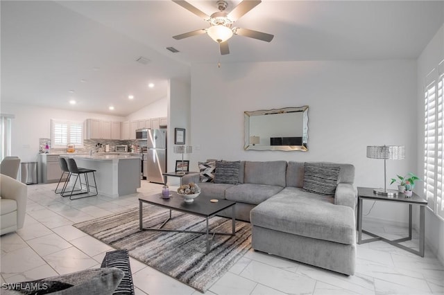 living room with visible vents, marble finish floor, recessed lighting, ceiling fan, and vaulted ceiling