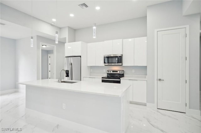 kitchen featuring white cabinets, visible vents, marble finish floor, and appliances with stainless steel finishes