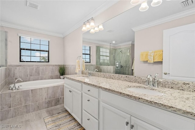 full bathroom with visible vents, ornamental molding, and a sink