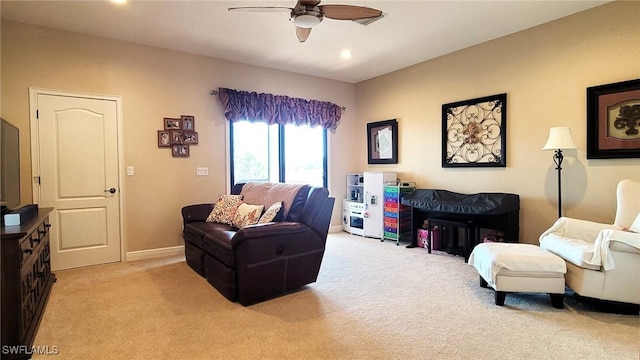 11573 SW Dallas Dr N, Lake Suzy, FL 34269 - living room featuring baseboards, recessed lighting, ceiling fan, and light colored carpet