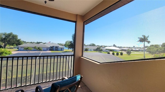 11573 SW Dallas Dr N, Lake Suzy, FL 34269 - balcony featuring a residential view