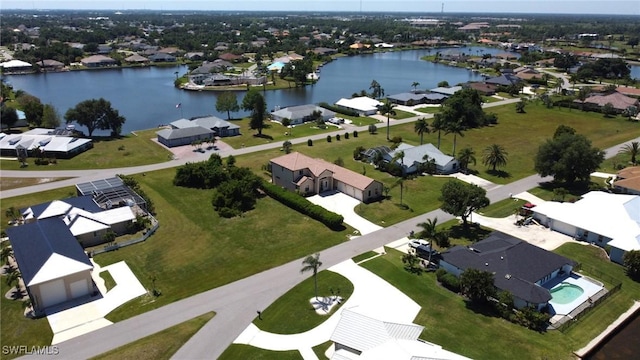 11573 SW Dallas Dr N, Lake Suzy, FL 34269 - drone / aerial view featuring a residential view and a water view
