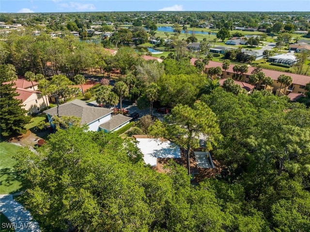 aerial view featuring a water view and a residential view