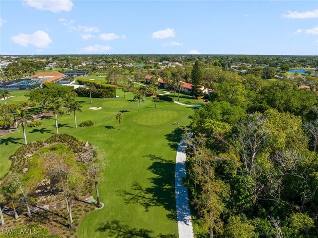 bird's eye view with view of golf course