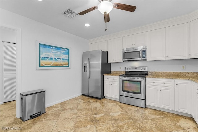 kitchen featuring white cabinetry, visible vents, and appliances with stainless steel finishes