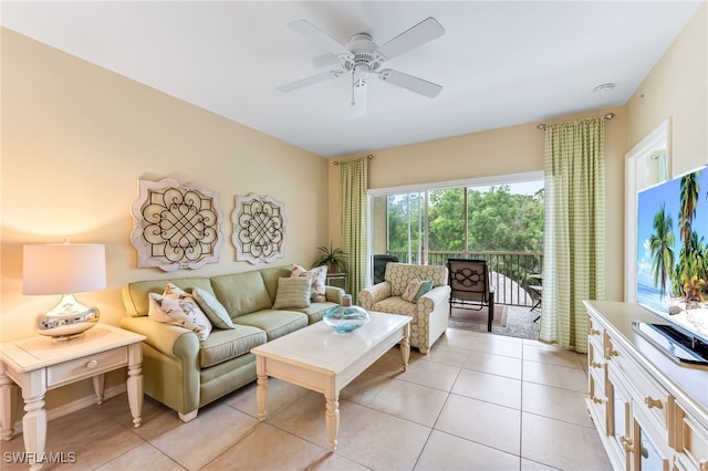 living room with light tile patterned floors and a ceiling fan