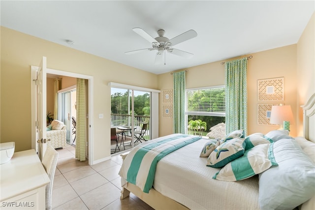 bedroom featuring light tile patterned floors, ceiling fan, and access to outside