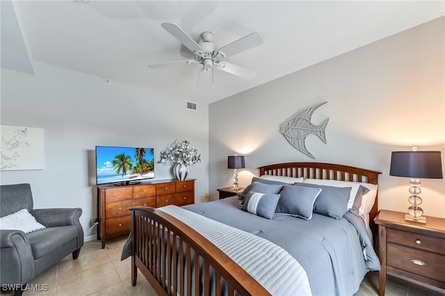 bedroom with light tile patterned floors, visible vents, and ceiling fan