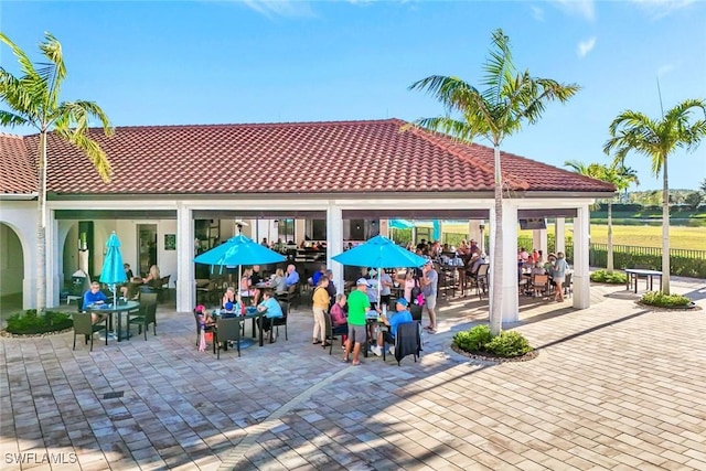 view of property's community featuring outdoor dining space