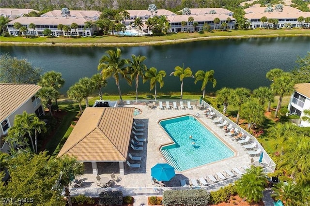 aerial view featuring a residential view and a water view