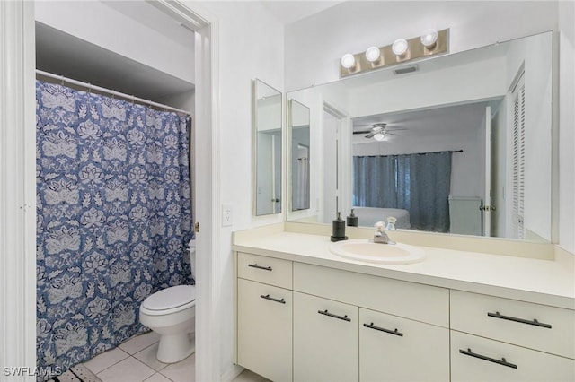 bathroom featuring vanity, visible vents, ceiling fan, tile patterned floors, and toilet