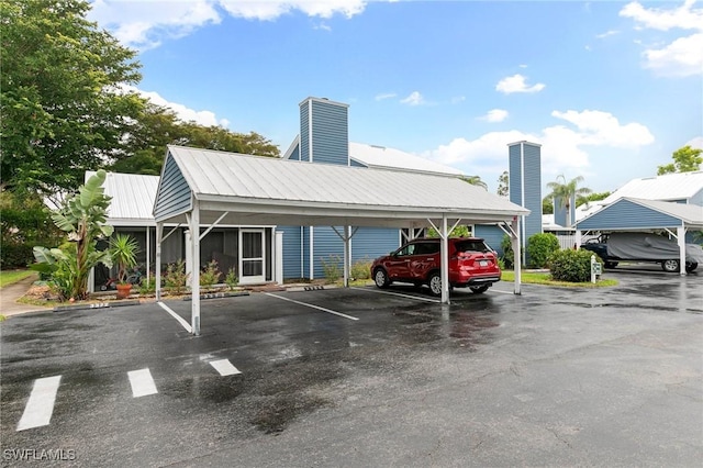 view of partially covered parking lot