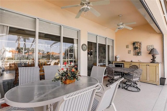 sunroom / solarium with ceiling fan