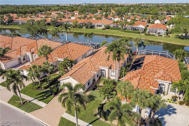 aerial view featuring a residential view and a water view