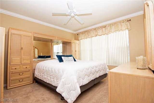 bedroom featuring light colored carpet, ceiling fan, and ornamental molding