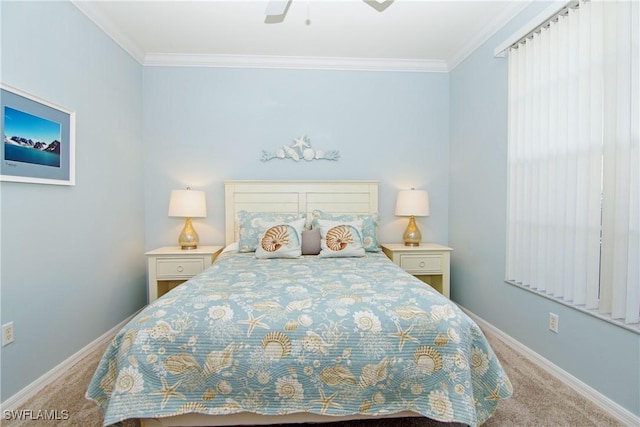 bedroom featuring baseboards, ornamental molding, and carpet flooring