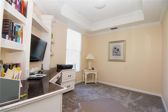 carpeted home office featuring visible vents, baseboards, crown molding, and a tray ceiling