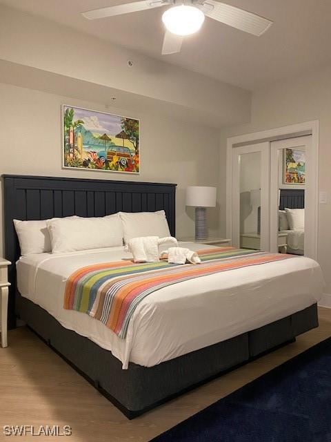 bedroom featuring wood finished floors and a ceiling fan