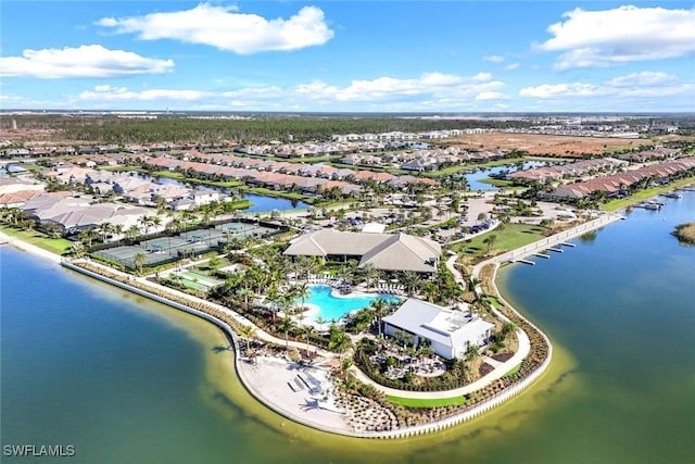 birds eye view of property featuring a water view and a residential view