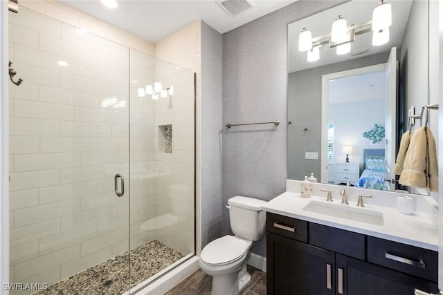 full bath with vanity, visible vents, ensuite bath, a stall shower, and toilet